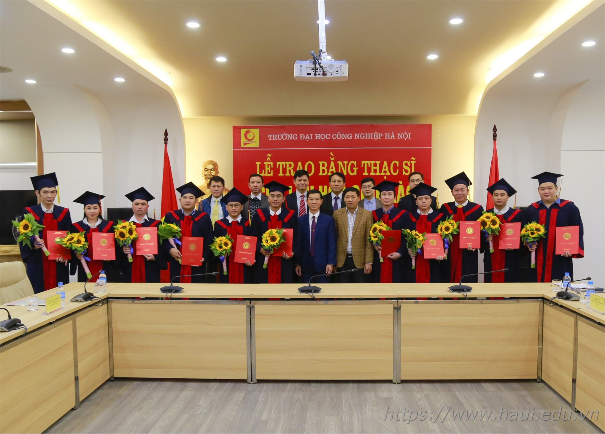 Graduation Ceremony and Award of Master's Degree for 12 Lao students