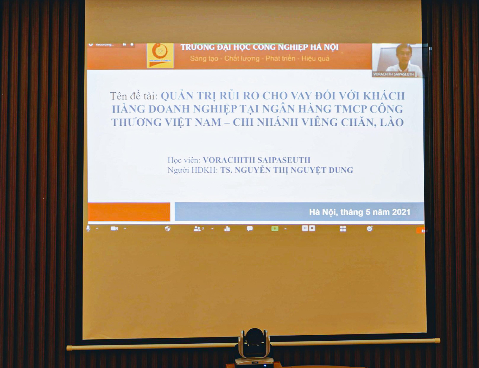 HaUI organizes an online Masters Thesis Defense for Laos students