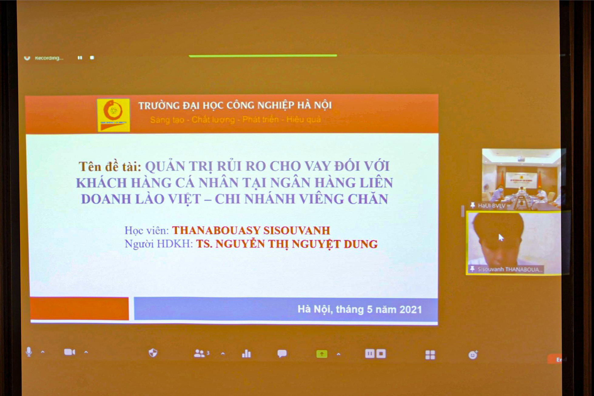 HaUI organizes an online Masters Thesis Defense for Laos students